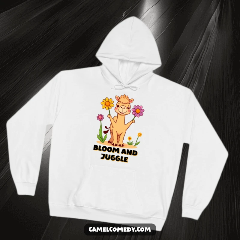 Funny Hoodie: a cute camel happily juggles three colorful desert flowers, radiating warmth and a humorous, playful vibe.