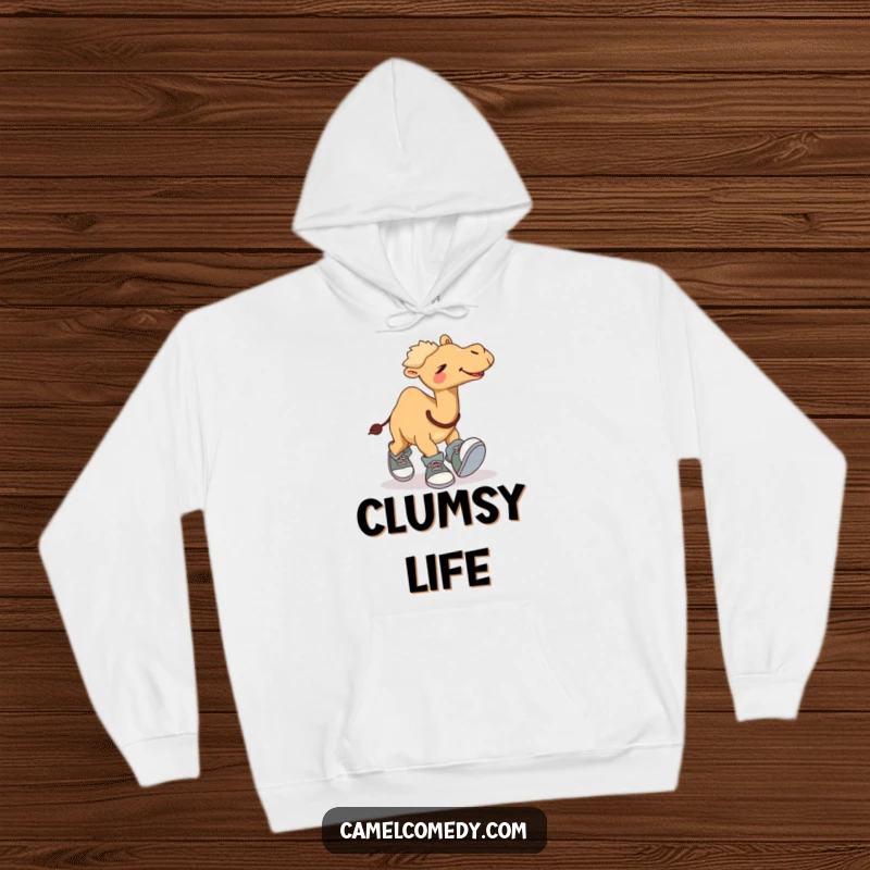 Funny hoodie featuring a giggling camel comically tripping over its own enormous shoes, a cozy and humorous apparel choice.
