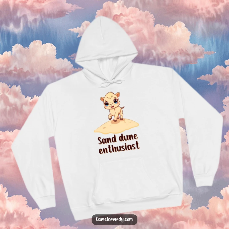 Funny camel hoodie showing a cute, tiny camel with big eyes bouncing on a sandy dune, offering warmth and humor.