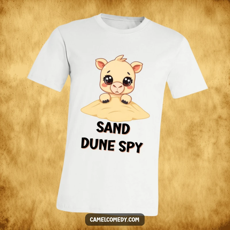 Funny Kawaii Camel T-Shirt: an adorable camel with large, expressive eyes peeks playfully over a sand dune, radiating funny curiosity.