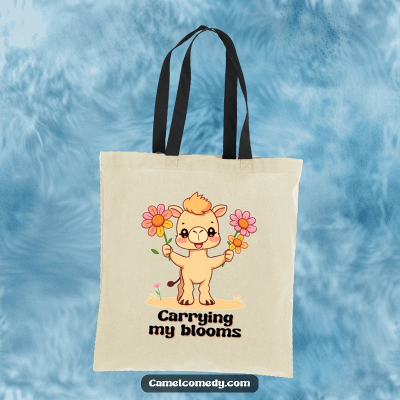 Funny tote bag featuring a charming camel artistically juggling three colorful desert flowers, ideal for toting goods with a smile.