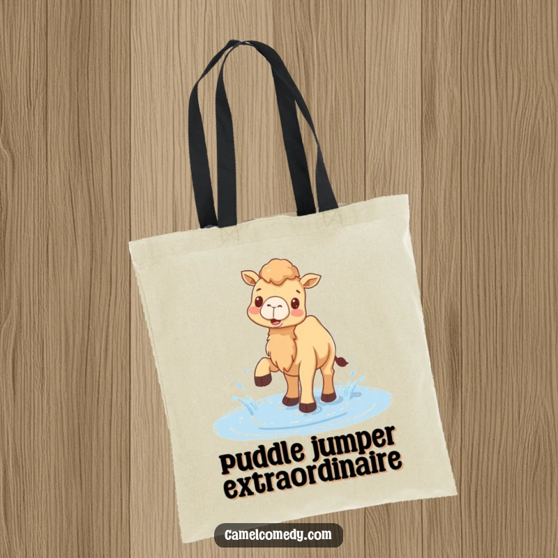 Funny tote bag displaying a jubilant camel splashing water with its feet in a puddle, bringing cheerful vibes.